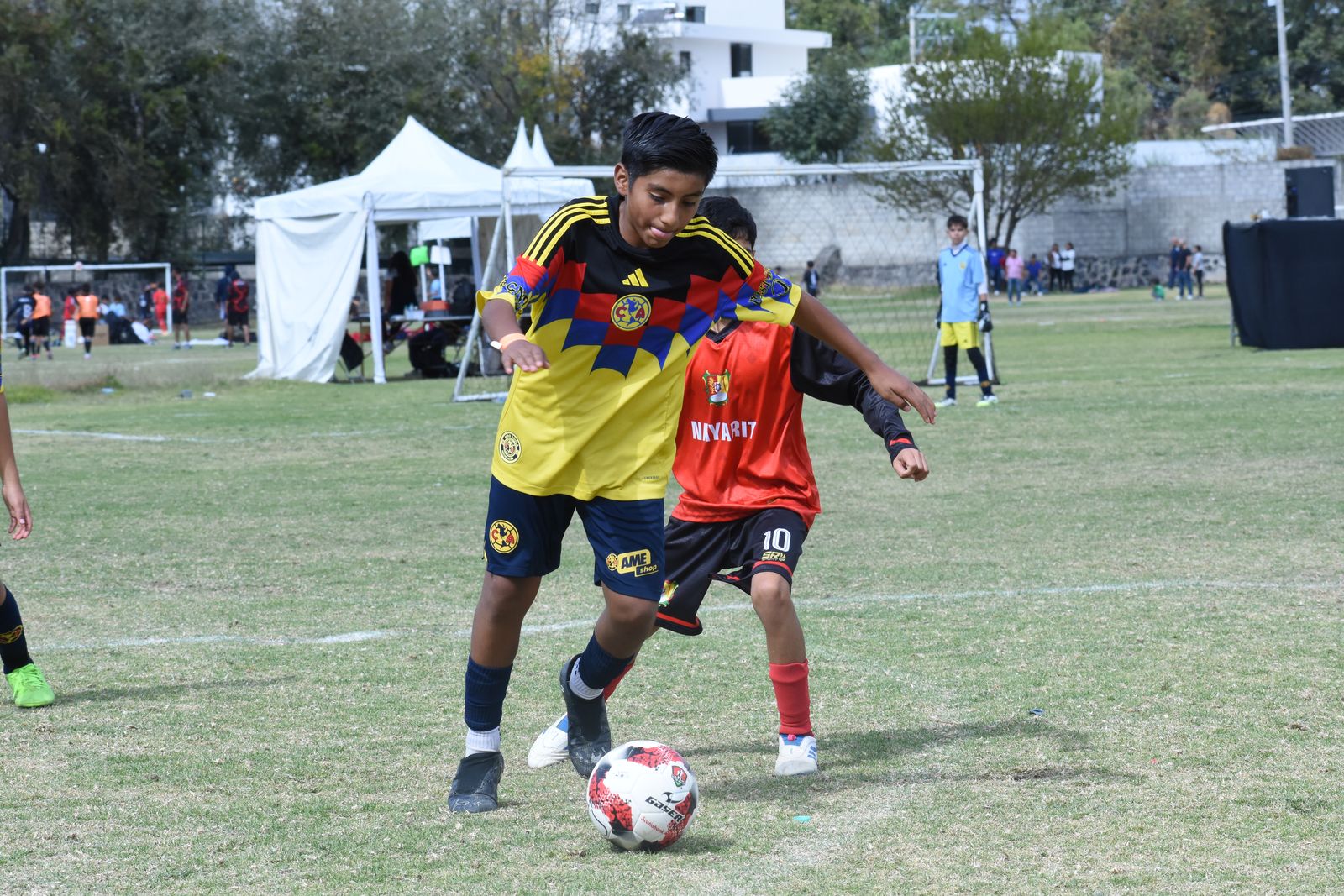 A player on the ball during a competitive match